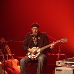 Pierre-LaRue-live-shot-red-bckrnd